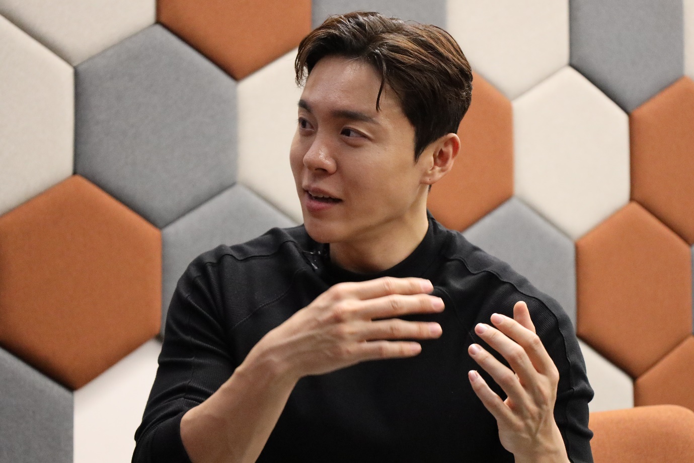 A person in black shirt

Description automatically generated