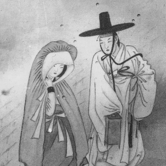 A couple of people wearing robes

Description automatically generated