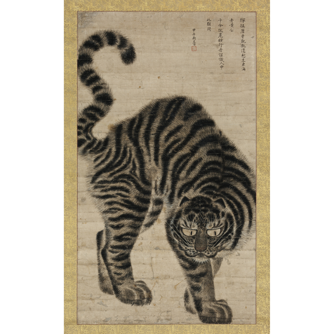 A tiger with a tail

Description automatically generated