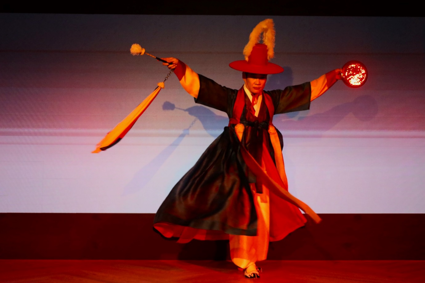 A person in a traditional garment

Description automatically generated