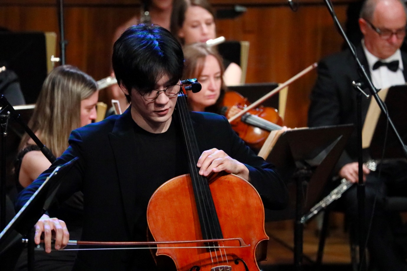 A person playing a cello

Description automatically generated