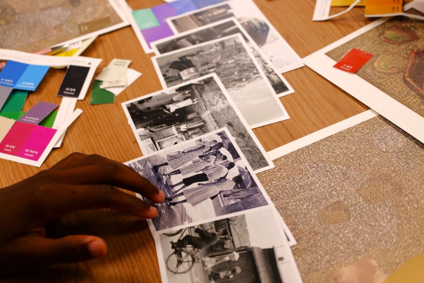 A hand touching a photo
Description automatically generated with medium confidence