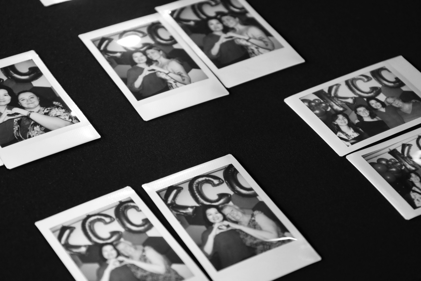 Polar polaroid photos of women making a hand gesture

Description automatically generated