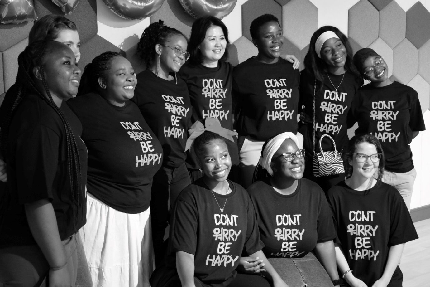 A group of women posing for a photo

Description automatically generated