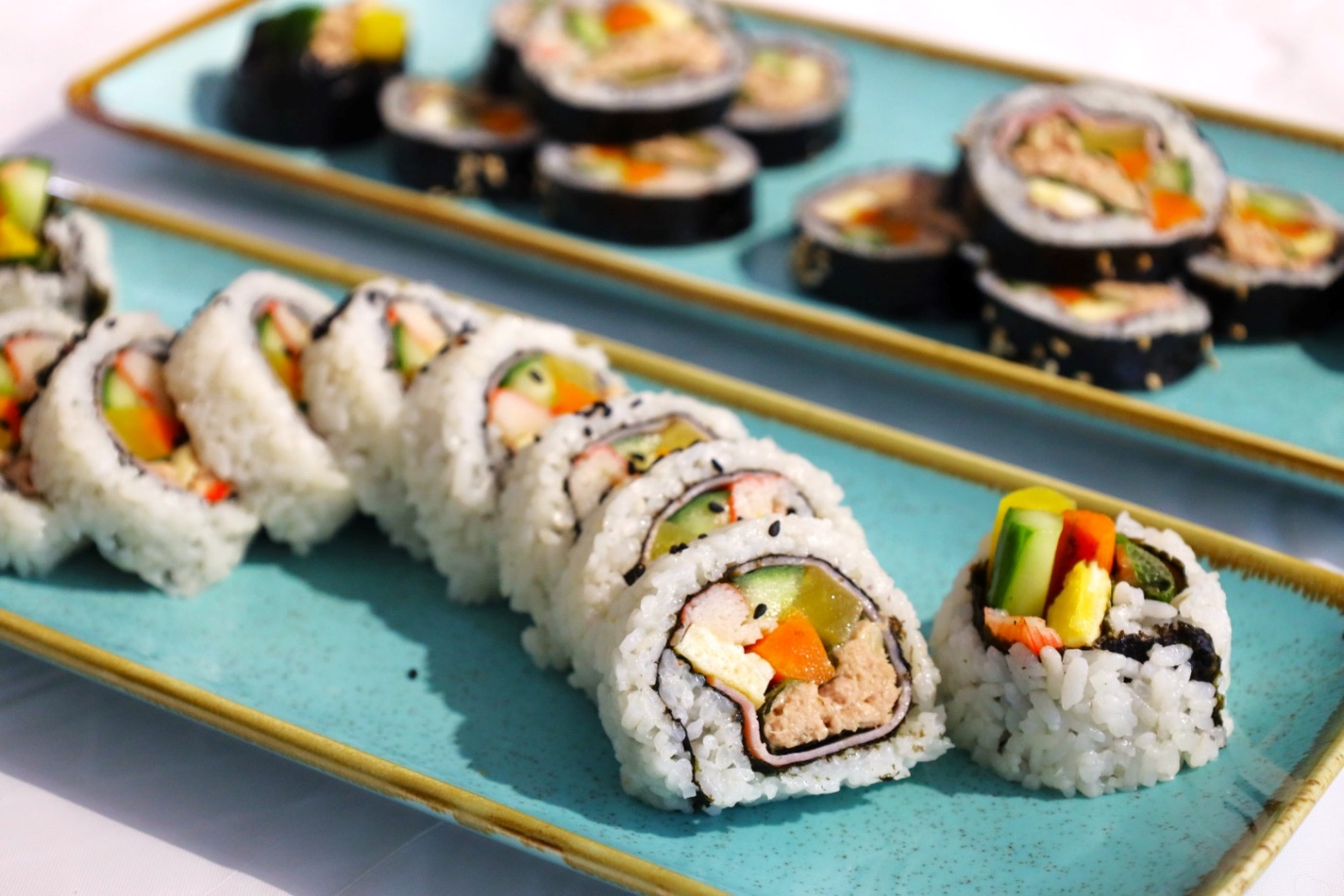 A plate of sushi

Description automatically generated