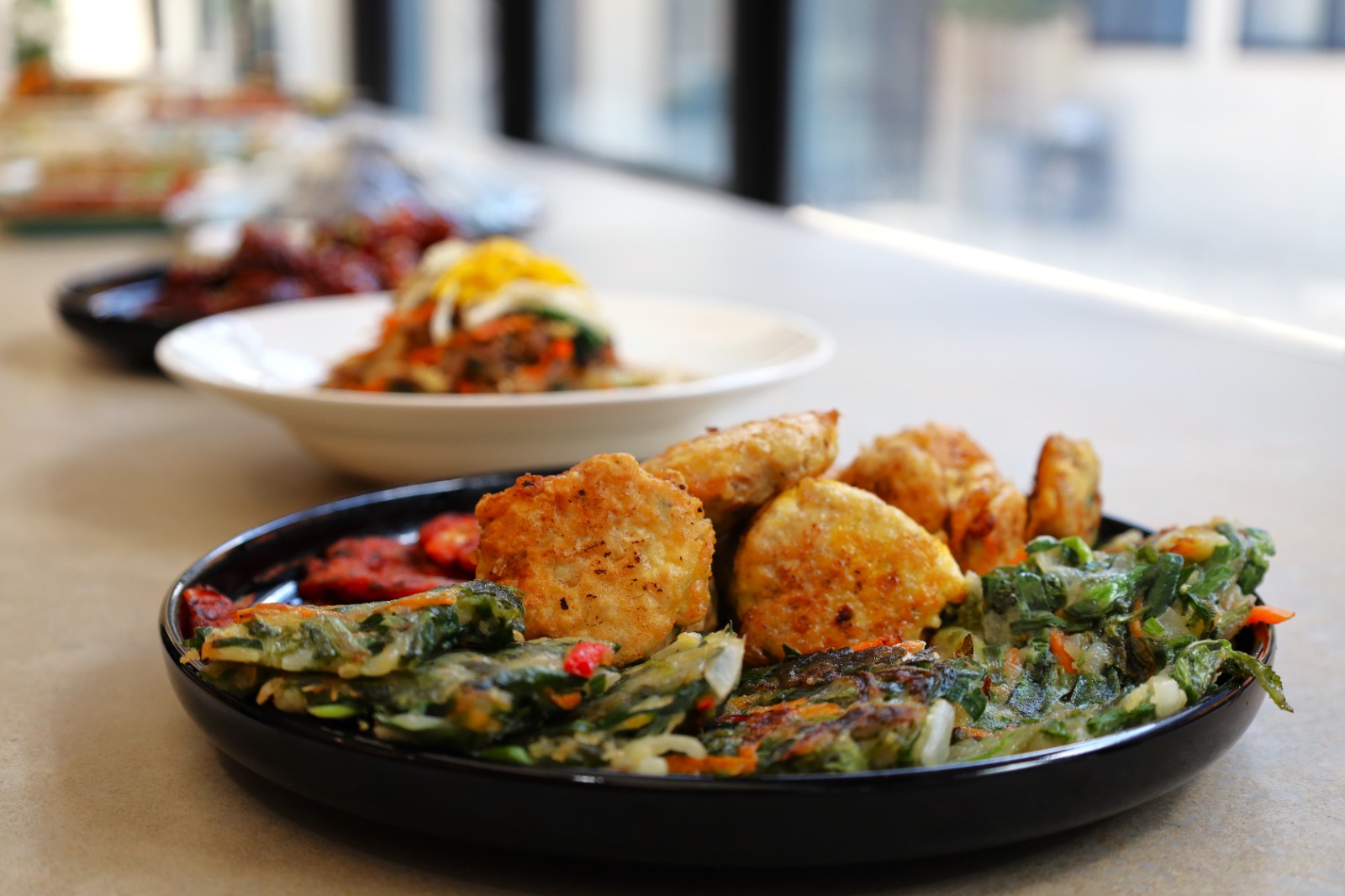 A plate of food on a table

Description automatically generated