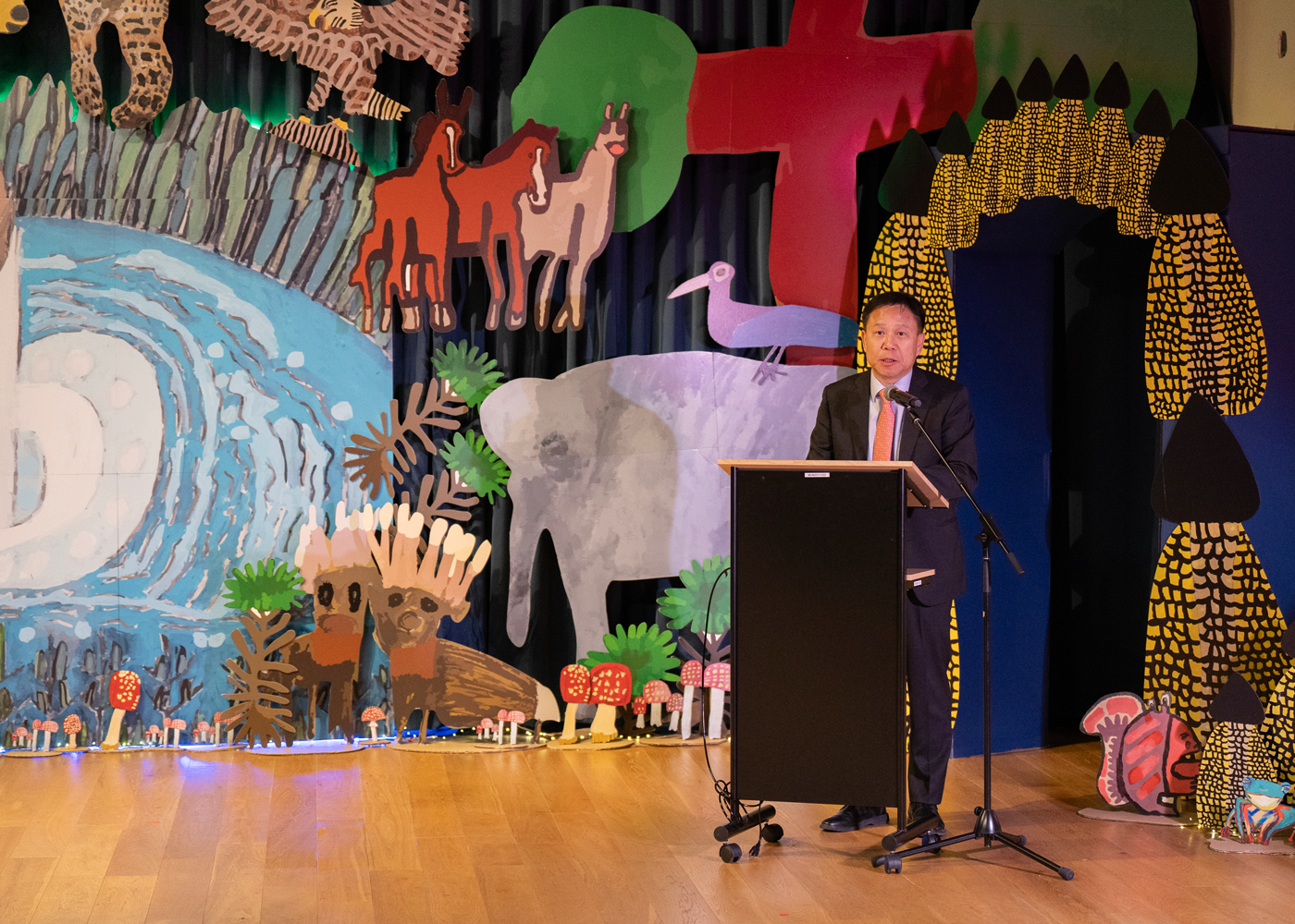 Ambassador Woongsoon Lim delivering opening remarks before the performance