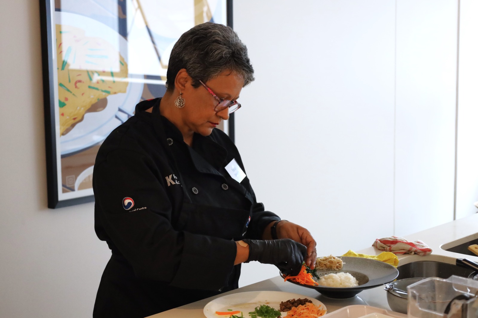 A person preparing food on a table

AI-generated content may be incorrect.