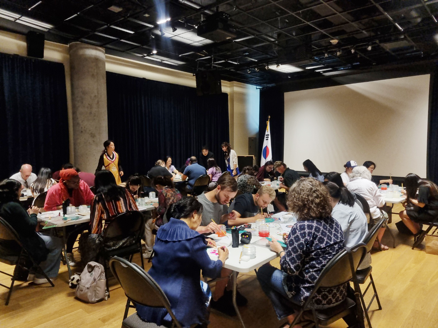 Participants engaging in the Dancheong workshop at the Cultural Centre’s multipurpose hall