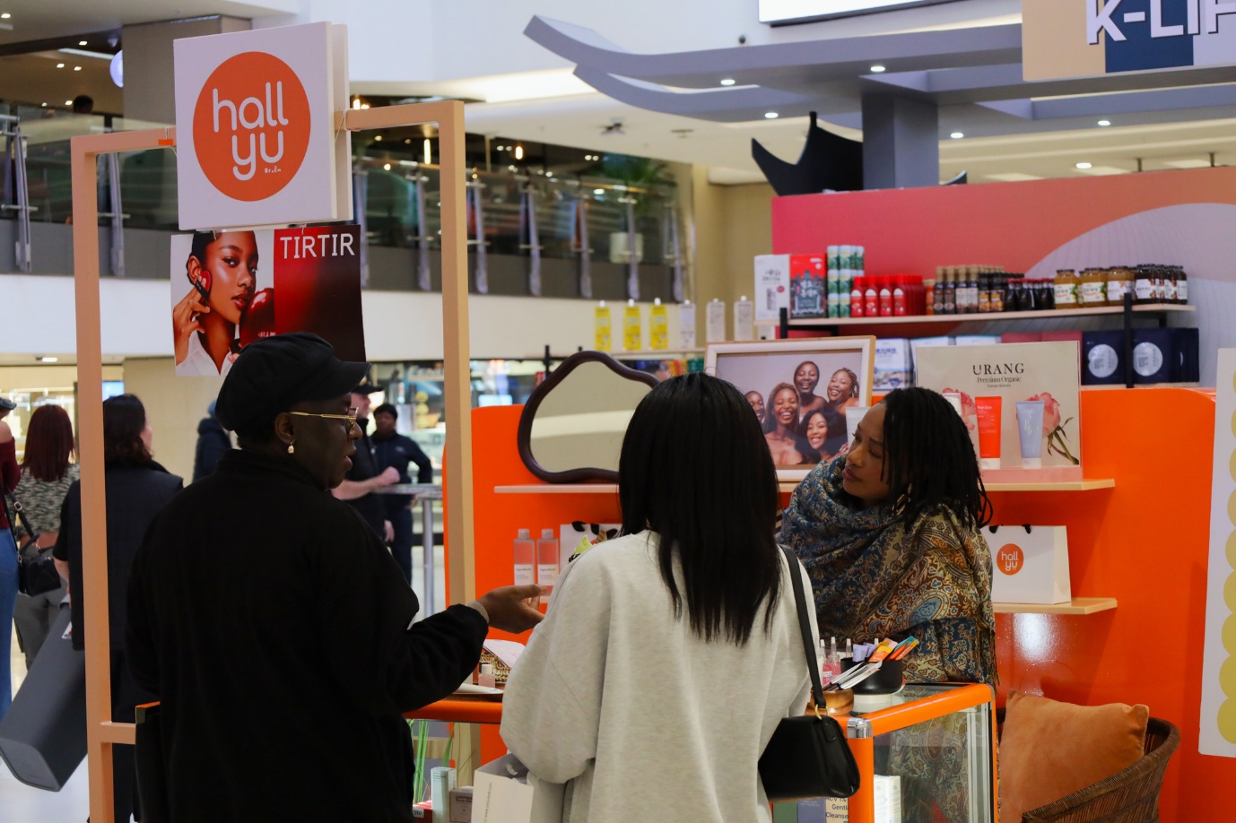 A group of women in a store

AI-generated content may be incorrect.
