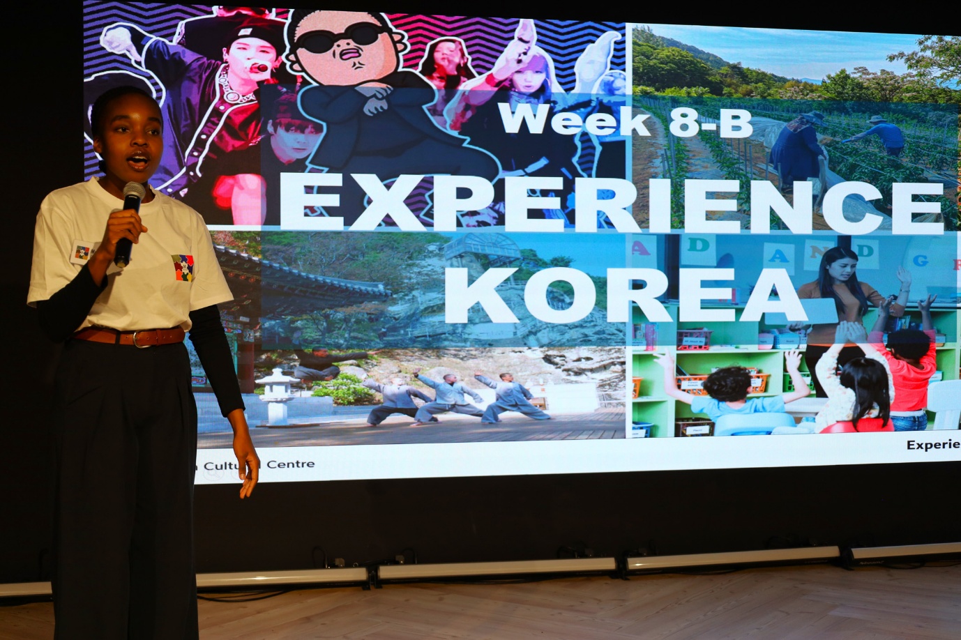 A person standing in front of a large screen

AI-generated content may be incorrect.