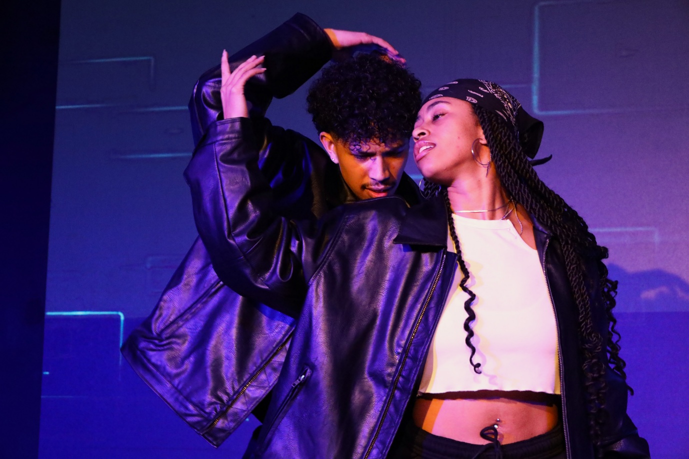 A person and person dancing

AI-generated content may be incorrect.
