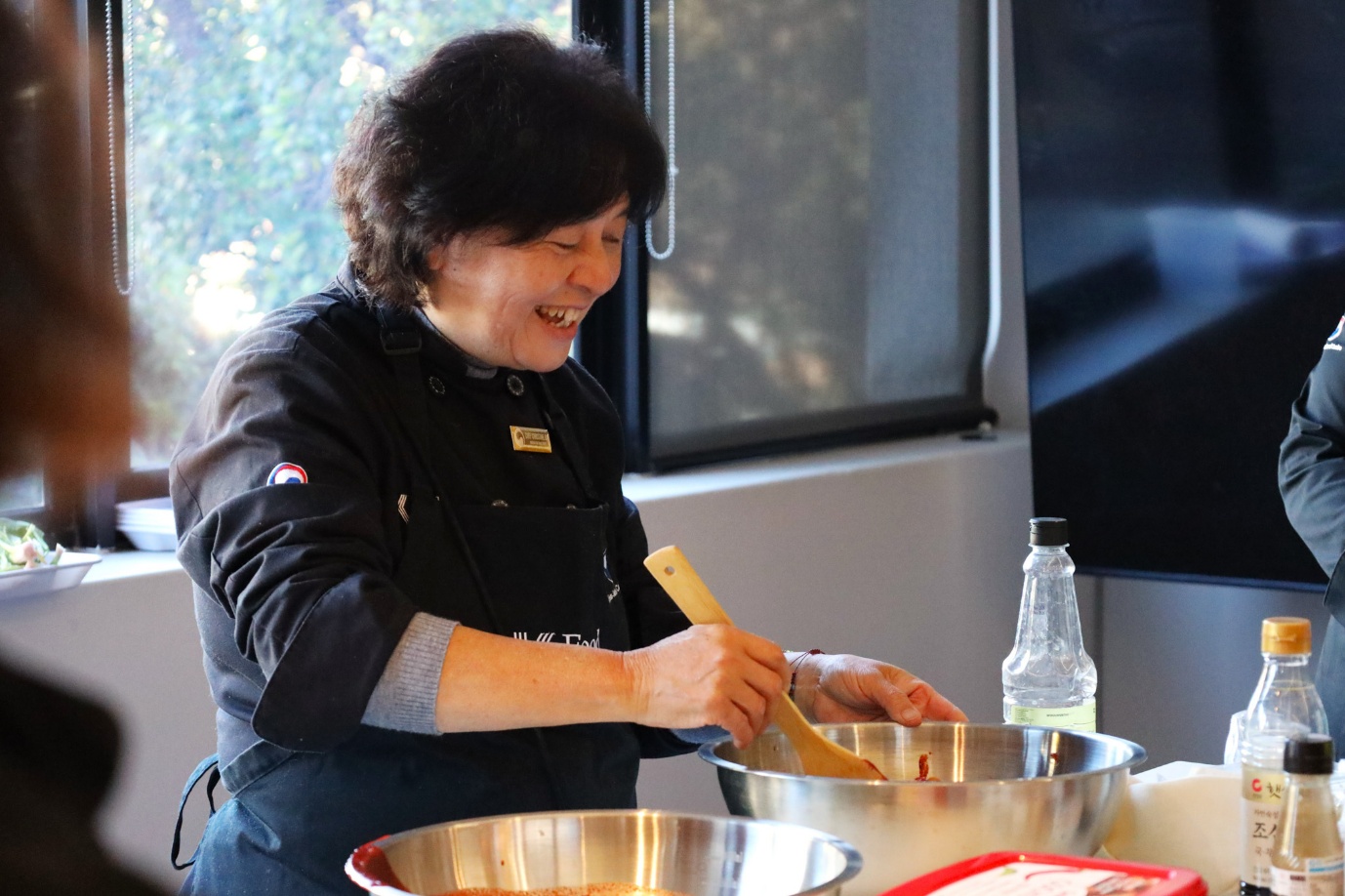 A person cooking in a kitchen

AI-generated content may be incorrect.