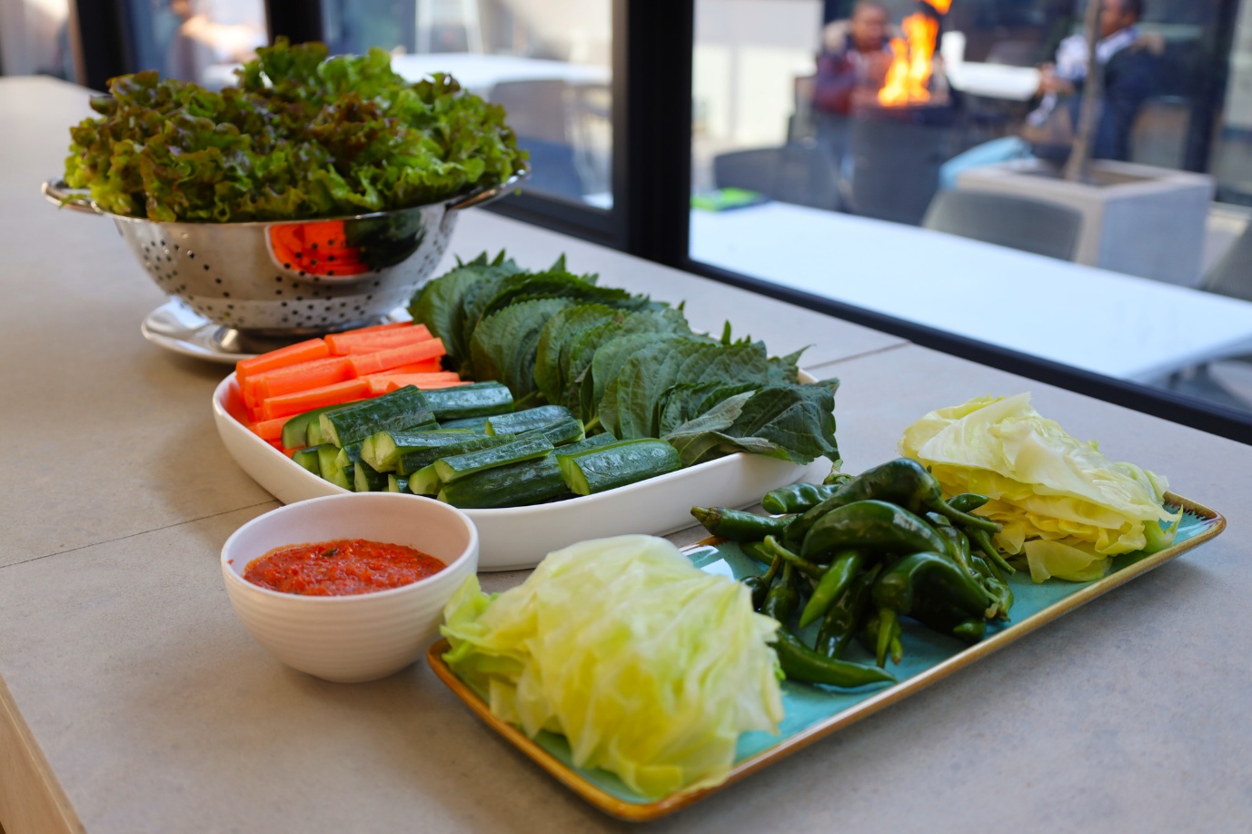 A table with different vegetables on it

AI-generated content may be incorrect.
