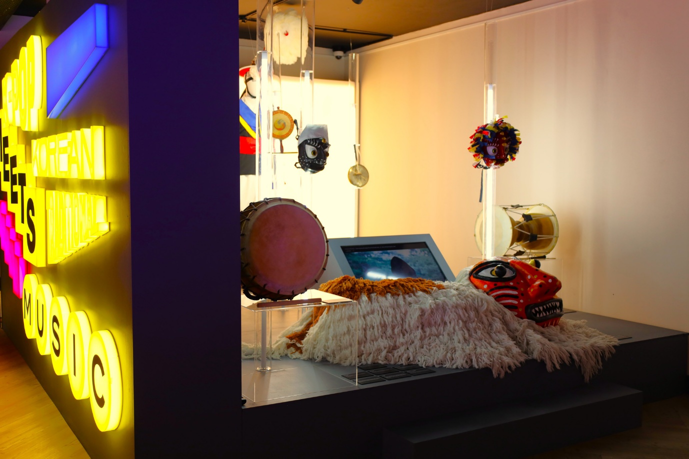 A room with a computer and drums

AI-generated content may be incorrect.