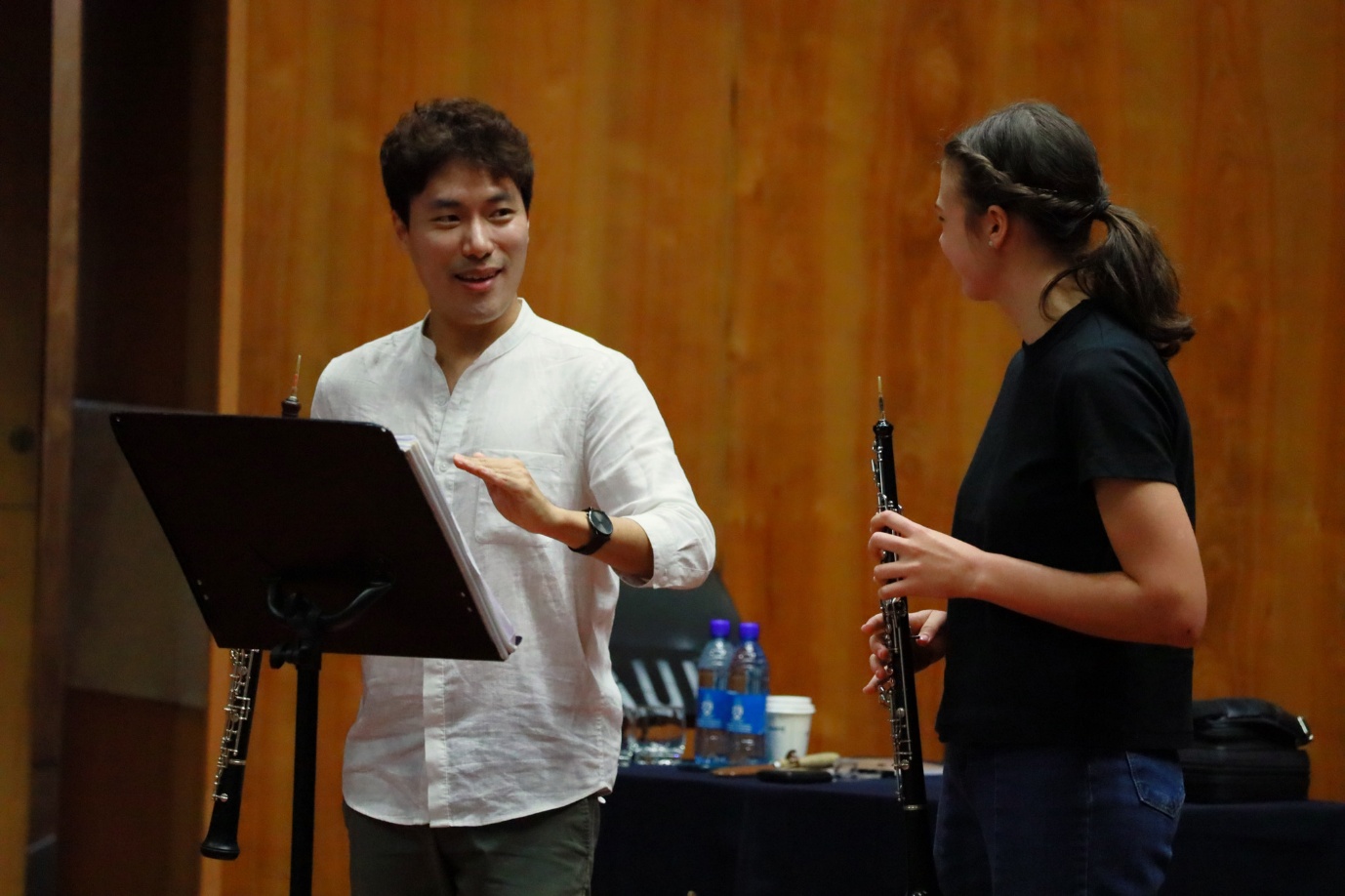 A person and person playing instruments
AI-generated content may be incorrect.